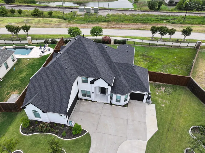 new roof on a white DFW home